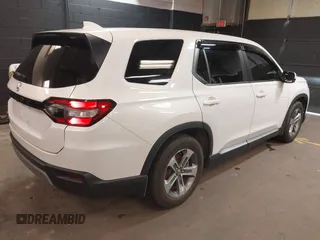 2023 Honda Pilot EX-L z VIN 5FNYG1H5XPB043275, wystawiony jako IAAI lot #41747522 z przebiegiem 18 865 mil mil oraz . Historia ofert i sprzedaży dostępna na DreamBid. Obrazek 4.