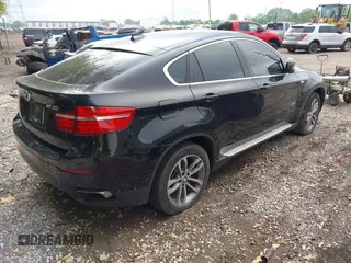 2013 BMW X6 xDrive50i z VIN 5UXFG8C56DL591241, wystawiony jako IAAI lot #42176792 z przebiegiem 142 973 mil mil oraz . Historia ofert i sprzedaży dostępna na DreamBid. Obrazek 4.
