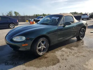 1999 Mazda MX-5 Miata z VIN JM1NB3531X0120808, wystawiony jako Copart lot #51849055 z przebiegiem Nie podano mil oraz Szkoda całkowita • Salvage title. Historia ofert i sprzedaży dostępna na DreamBid. Obrazek 1.