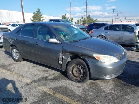 2004 Toyota Camry LE with VIN 4T1BE32K34U917387, listed as a IAAI auction lot 41735677 with 298,736 mi miles. Bid and sale history available at carsss.com. Image 1.