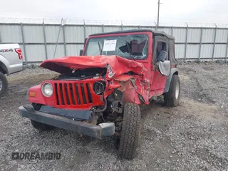 1997 Jeep Wrangler Sport z VIN 1J4FY19S2VP426553, wystawiony jako IAAI lot #41917764 z przebiegiem 154 140 mil mil oraz . Historia ofert i sprzedaży dostępna na DreamBid. Obrazek 6.