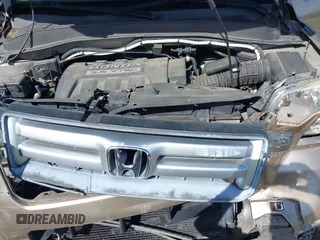 2006 Honda Pilot EX-L with VIN 2HKYF18566H561371, listed as a IAAI auction lot 41950296 with 145,579 mi miles and . Bid and sale history available at DreamBid. Image 10.