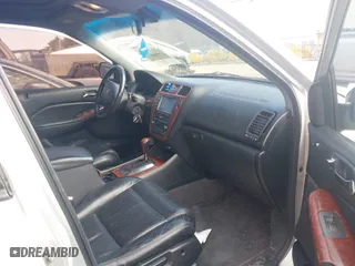 2005 Acura MDX Touring with VIN 2HNYD18655H513456, listed as a IAAI auction lot 41704464 with 203,391 mi miles. Bid and sale history available at carsss.com. Image 5.