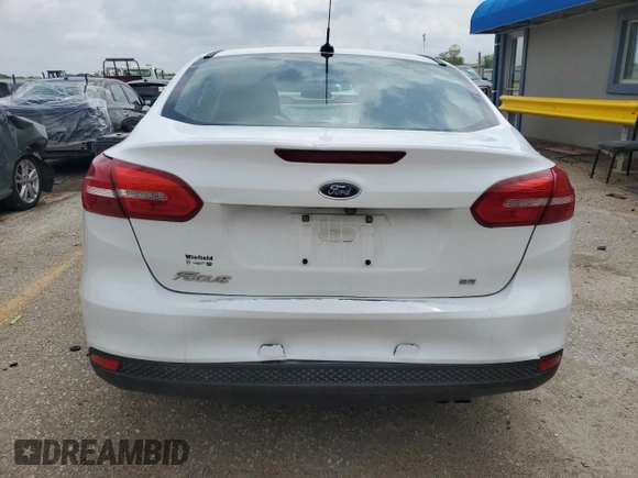 2018 Ford Focus SE с VIN 1FADP3F23JL201582, выставлен на аукционе Copart как лот 54722395 с пробегом 95 710 миль миль и Списание • Salvage title. История ставок и продаж доступна на DreamBid. Изображение 6.