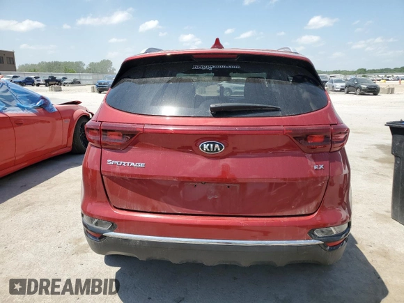 2020 Kia Sportage EX with VIN KNDPNCAC5L7708606, listed as a Copart auction lot 56987605 with 99,018 mi miles and Salvage title. Bid and sale history available at DreamBid. Image 6.