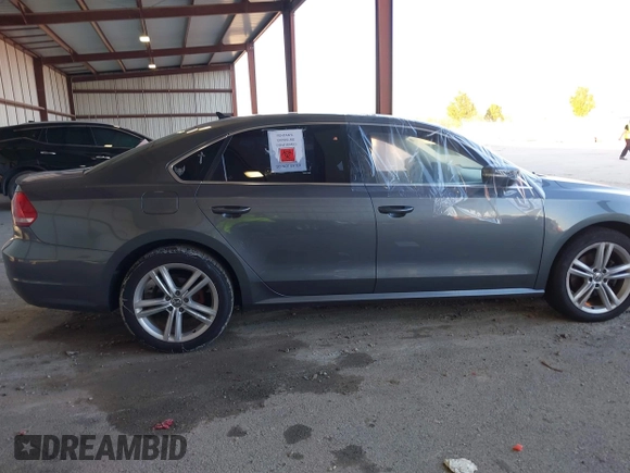 2014 Volkswagen Passat SE z VIN 1VWBN7A32EC059503, wystawiony jako IAAI lot #40876045 z przebiegiem Nie podano mil oraz . Historia ofert i sprzedaży dostępna na DreamBid. Obrazek 8.