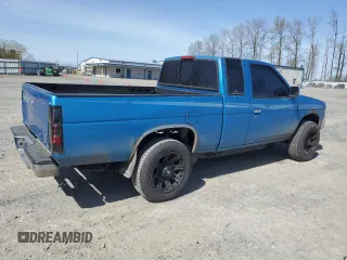 1997 Nissan Frontier XE with VIN 1N6SD16S0VC301978, listed as a Copart auction lot 51868585 with 183,836 mi miles and Clean title. Bid and sale history available at DreamBid. Image 3.
