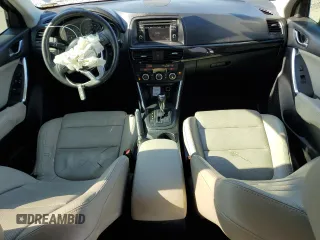 2014 Mazda CX-5 Grand Touring with VIN JM3KE2DY8E0361108, listed as a Copart auction lot 52876965 with 116,135 mi miles and Salvage Title. Bid and sale history available at carsss.com. Image 8.