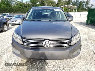 2014 Volkswagen Tiguan S z VIN WVGBV3AX2EW519798, wystawiony jako Copart lot #60316895 z przebiegiem 182 002 mil mil oraz Czysty tytuł • Clean title. Historia ofert i sprzedaży dostępna na DreamBid. Obrazek 5.