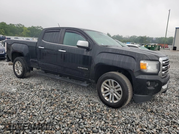 2016 GMC Canyon 4WD SLT with VIN 1GTP6DE1XG1349788, listed as a Copart auction lot 50410535 with 210,587 mi miles and Clean Title. Bid and sale history available at carsss.com. Image 4.