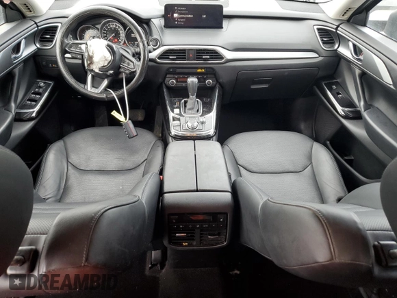 2023 Mazda CX-9 Touring with VIN JM3TCBCY4P0654597, listed as a Copart auction lot 55920855 with 58,534 mi miles and Salvage title. Bid and sale history available at DreamBid. Image 8.