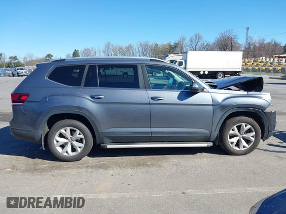 2018 Volkswagen Atlas SE with VIN 1V2CR2CA0JC571988, listed as a IAAI auction lot 41848862 with 96,426 mi miles and . Bid and sale history available at DreamBid. Image 13.