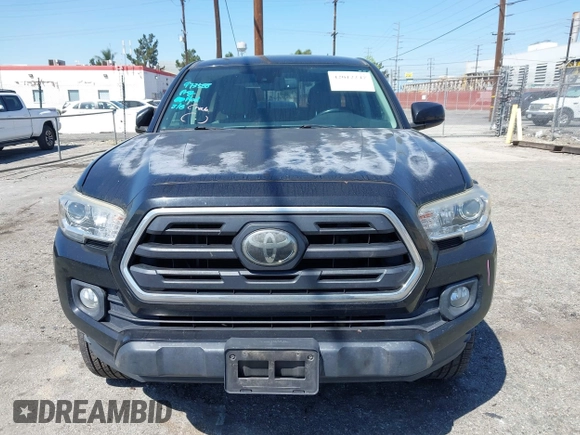 2018 Toyota Tacoma SR5 with VIN 3TMAZ5CN1JM061127, listed as a IAAI auction lot 42012247 with 119,381 mi miles and . Bid and sale history available at DreamBid. Image 12.