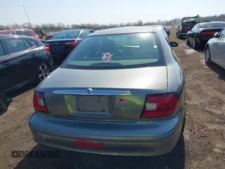 2003 Mercury Sable GS z VIN 1MEFM50243A619761, wystawiony jako IAAI lot #41790150 z przebiegiem 114 522 mil mil oraz . Historia ofert i sprzedaży dostępna na DreamBid. Obrazek 16.