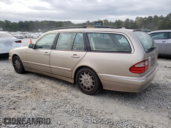 2001 Mercedes-Benz E-Class with VIN WDBJH65J41B312277, listed as a Copart auction lot 70261594 with 123,702 mi miles and Clean Title. Bid and sale history available at carsss.com. Image 2.