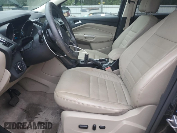 2015 Ford Escape Titanium with VIN 1FMCU0J96FUC00683, listed as a Copart auction lot 58345105 with 61,031 mi miles and Salvage title. Bid and sale history available at DreamBid. Image 7.