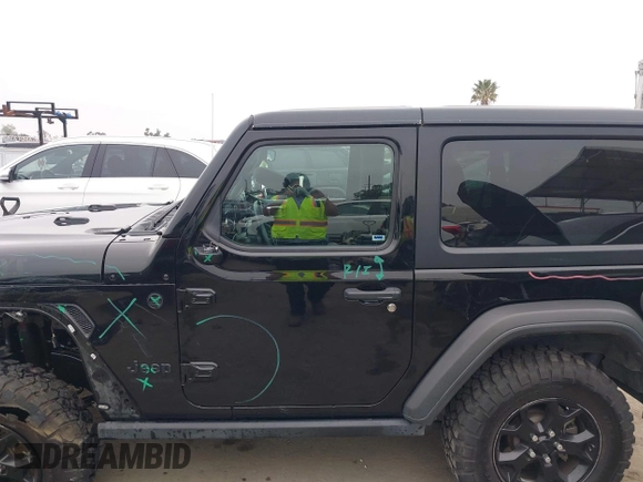 2021 Jeep Wrangler Sport with VIN 1C4GJXAN5MW627228, listed as a IAAI auction lot 42170010 with 56,965 mi miles and . Bid and sale history available at DreamBid. Image 14.