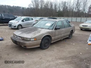 1996 Oldsmobile Cutlass Supreme S z VIN 1G3WH52M9TF377685, wystawiony jako IAAI lot #41496775 z przebiegiem 197 366 mil mil oraz . Historia ofert i sprzedaży dostępna na DreamBid. Obrazek 2.