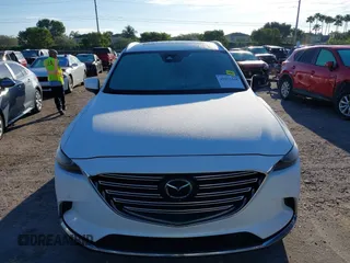 2019 Mazda CX-9 Grand Touring with VIN JM3TCADY3K0305173, listed as a IAAI auction lot 41672448 with 132,265 mi miles. Bid and sale history available at carsss.com. Image 12.