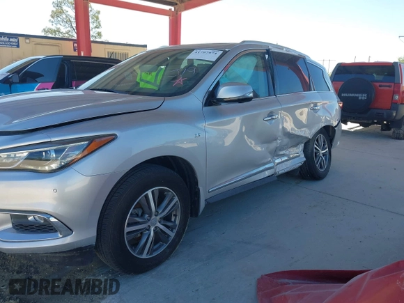 2020 Infiniti QX60 Luxe with VIN 5N1DL0MM2LC503968, listed as a IAAI auction lot 41797974 with 65,128 mi miles and . Bid and sale history available at DreamBid. Image 6.