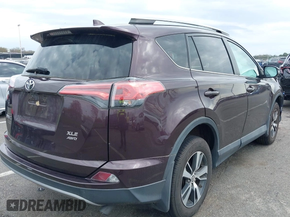 2018 Toyota RAV4 XLE with VIN 2T3RFREV5JW811742, listed as a IAAI auction lot 42030276 with 58,034 mi miles. Bid and sale history available at carsss.com. Image 4.