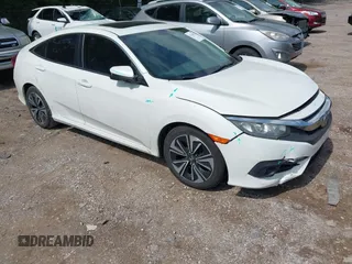 2016 Honda Civic EX-L with VIN 19XFC1F74GE029773, listed as a IAAI auction lot 42528617 with 122,085 mi miles and . Bid and sale history available at DreamBid. Image 1.