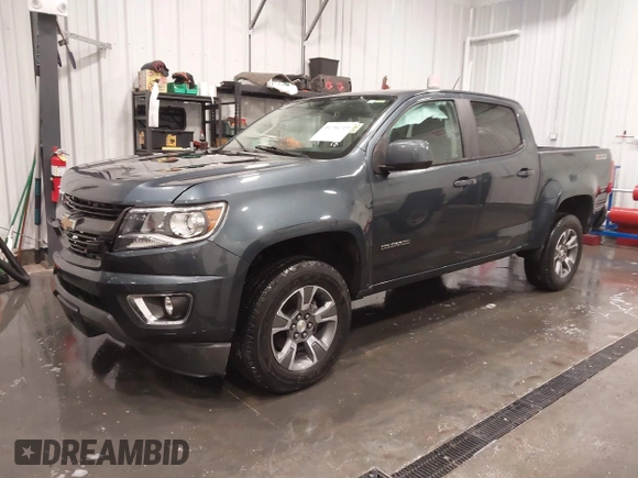 2020 Chevrolet Colorado 4WD Z71 with VIN 1GCGTDEN1L1163546, listed as a IAAI auction lot 41706719 with 64,662 mi miles and . Bid and sale history available at DreamBid. Image 2.