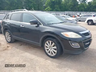 2010 Mazda CX-9 Sport z VIN JM3TB2MA5A0229059, wystawiony jako IAAI lot #42234197 z przebiegiem 232 392 mil mil oraz . Historia ofert i sprzedaży dostępna na DreamBid. Obrazek 1.