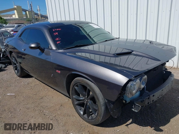 2017 Dodge Challenger R/T Plus with VIN 2C3CDZBT8HH600032, listed as a IAAI auction lot 42173591 with 92,303 mi miles and . Bid and sale history available at DreamBid. Image 1.