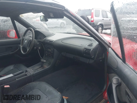 1996 BMW 3 Series Z3 1.9 z VIN 4USCH7323TLB69098, wystawiony jako IAAI lot #41557656 z przebiegiem 67 858 mil mil oraz . Historia ofert i sprzedaży dostępna na DreamBid. Obrazek 5.
