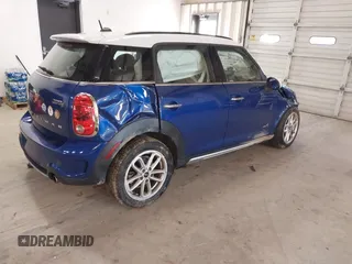 2015 MINI Countryman S z VIN WMWZC5C58FWP45505, wystawiony jako IAAI lot #41012241 z przebiegiem 108 986 mil mil oraz . Historia ofert i sprzedaży dostępna na DreamBid. Obrazek 4.