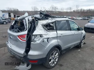 2013 Ford Escape SEL with VIN 1FMCU9H92DUA90495, listed as a IAAI auction lot 41780306 with 139,979 mi miles. Bid and sale history available at carsss.com. Image 4.