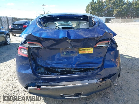 2023 Tesla Model Y Long Range with VIN 7SAYGDEE3PF674457, listed as a IAAI auction lot 41822138 with 43,901 mi miles. Bid and sale history available at carsss.com. Image 15.