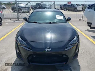 2014 Scion FR-S z VIN JF1ZNAA10E8703778, wystawiony jako IAAI lot #42264695 z przebiegiem 117 889 mil mil oraz . Historia ofert i sprzedaży dostępna na DreamBid. Obrazek 12.