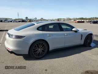 2023 Porsche Panamera z VIN WP0AJ2A79PL101328, wystawiony jako Copart lot #55093015 z przebiegiem 26 927 mil mil oraz Szkody całkowita. Historia ofert i sprzedaży dostępna na DreamBid. Obrazek 3.