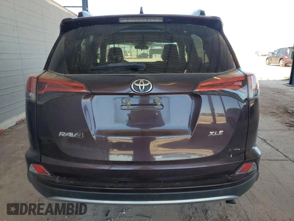 2018 Toyota RAV4 XLE with VIN 2T3WFREV4JW501665, listed as a Copart auction lot 58071805 with 47,777 mi miles and Salvage title. Bid and sale history available at DreamBid. Image 6.
