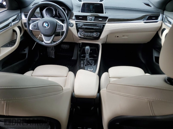 2018 BMW X2 sDrive28i with VIN WBXYJ3C35JEJ89968, listed as a Copart auction lot 87488354 with 68,945 mi miles and Salvage title. Bid and sale history available at DreamBid. Image 8.