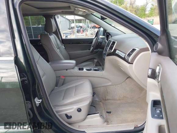 2011 Jeep Grand Cherokee 70th Anniversary with VIN 1J4RR4GG3BC631831, listed as a IAAI auction lot 42038415 with 130,811 mi miles. Bid and sale history available at carsss.com. Image 5.