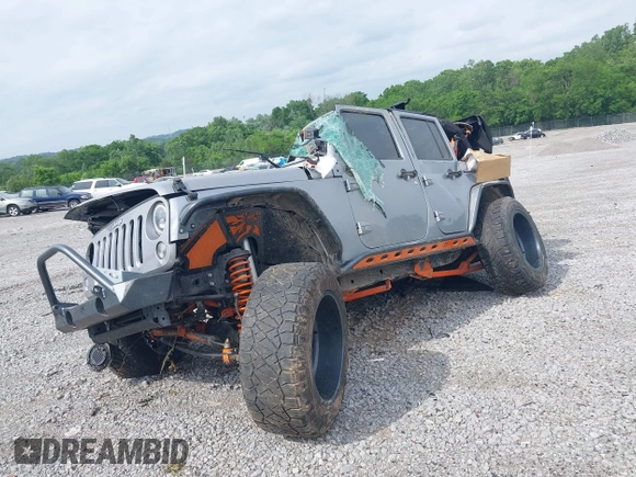 2015 Jeep Wrangler Unlimited Freedom with VIN 1C4BJWDG3FL682296, listed as a IAAI auction lot 42275536 with Not provided miles and . Bid and sale history available at DreamBid. Image 2.