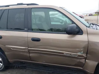 2003 GMC Envoy SLE with VIN 1GKDT13S332264984, listed as a IAAI auction lot 41523191 with 227,004 mi miles. Bid and sale history available at carsss.com. Image 13.