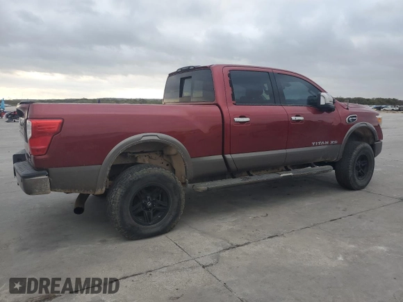 2016 Nissan Titan XD PRO-4X with VIN 1N6BA1F45GN500008, listed as a Copart auction lot 77282724 with 119,868 mi miles and Clean Title. Bid and sale history available at carsss.com. Image 3.