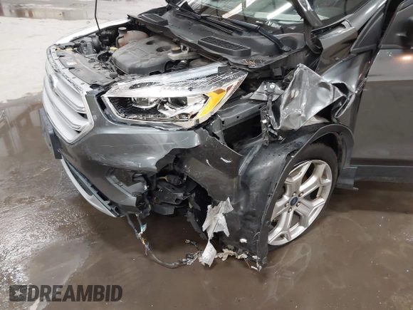 2019 Ford Escape Titanium with VIN 1FMCU9J91KUB11957, listed as a IAAI auction lot 41928264 with 72,460 mi miles. Bid and sale history available at carsss.com. Image 6.