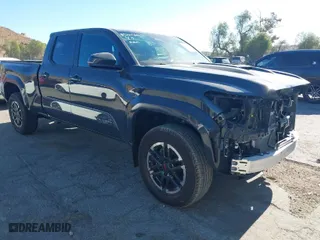2024 Toyota Tacoma 2WD SR5 with VIN 3TMLB5FN3RM001404, listed as a IAAI auction lot 41322388 with 8,319 mi miles. Bid and sale history available at carsss.com. Image 1.