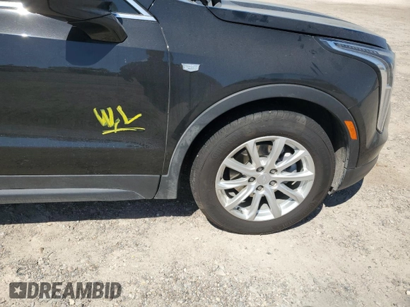 2023 Cadillac XT4 FWD Luxury z VIN 1GYAZAR46PF178003, wystawiony jako Copart lot #52024665 z przebiegiem 42 000 mil mil oraz Szkoda całkowita • Salvage title. Historia ofert i sprzedaży dostępna na DreamBid. Obrazek 13.
