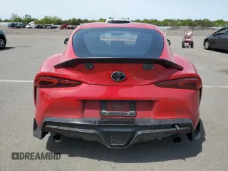 2021 Toyota Supra 3.0 z VIN WZ1DB0C09MW038550, wystawiony jako Copart lot #58066195 z przebiegiem Nie podano mil oraz Tytuł czysty. Historia ofert i sprzedaży dostępna na DreamBid. Obrazek 6.