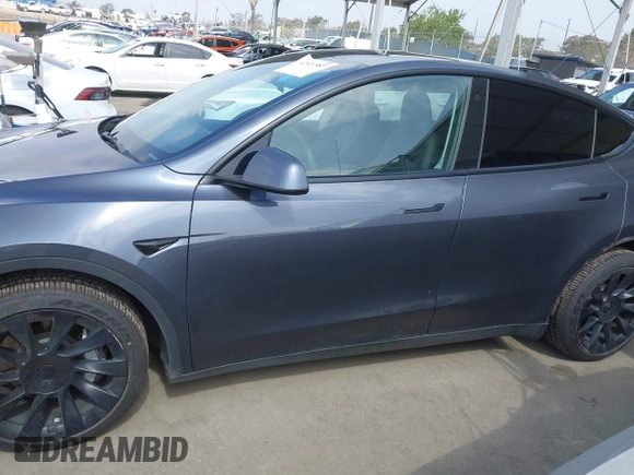 2022 Tesla Model Y Long Range z VIN 7SAYGDEE6NF364994, wystawiony jako IAAI lot #42322587 z przebiegiem 41 572 mil mil oraz . Historia ofert i sprzedaży dostępna na DreamBid. Obrazek 15.