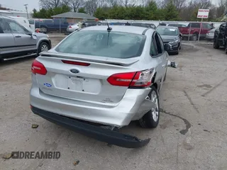2015 Ford Focus SE with VIN 1FADP3F24FL347206, listed as a IAAI auction lot 41941987 with 96,473 mi miles and . Bid and sale history available at DreamBid. Image 4.