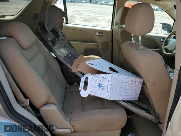 2007 Ford Freestyle SEL z VIN 1FMDK02167GA22907, wystawiony jako Copart lot #59721645 z przebiegiem Nie podano mil oraz Szkoda całkowita • Salvage title. Historia ofert i sprzedaży dostępna na DreamBid. Obrazek 11.