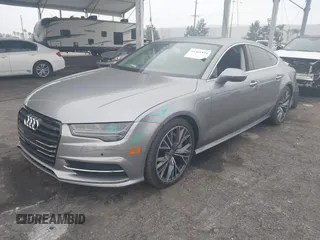 2016 Audi A7 3.0 Premium Plus with VIN WAUWGAFC0GN003357, listed as a IAAI auction lot 41468854 with 62,590 mi miles. Bid and sale history available at carsss.com. Image 2.