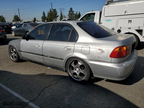 2000 Honda Civic VP with VIN 2HGEJ6612YH577711, listed as a Copart auction lot 52239805 with 195,138 mi miles and Salvage Title. Bid and sale history available at carsss.com. Image 2.